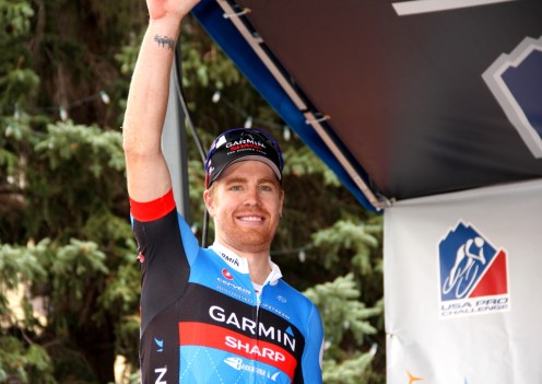 Tyler Farrar steps onto the podium in Telluride to receive the first 2012 USA Pro Challenge yellow jersey