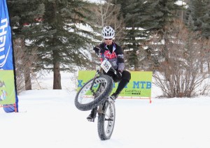 Chad Melis shows even snow bikes can do wheelies
