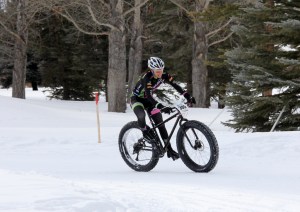 Rebecca Gross taming her snow bike beast