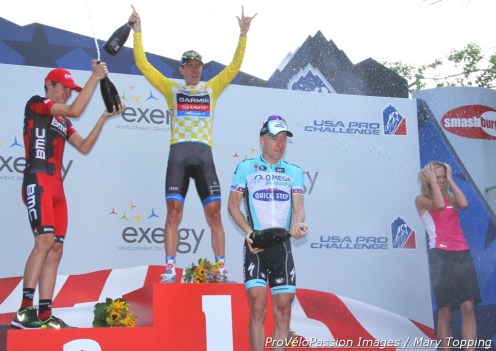 2012 USA Pro Challenge final podium champagne frenzy: Tejay van Garderen 2nd, Christian Vande Velde 1st, Levi Leipheimer 3rd (l to r)