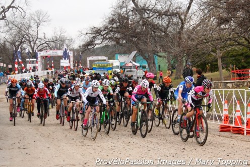 Arly Kemmerer guides the elite women after the start of 2015 cyclocross nationals. Katie Compton will slot into the first ten riders to begin lap one.
