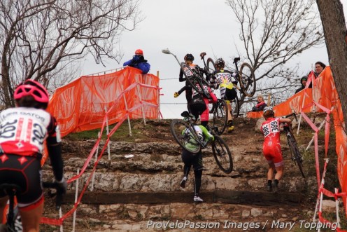 Kristin Weber at the front of the early leader's group in lap 1 on the short limestone stairs