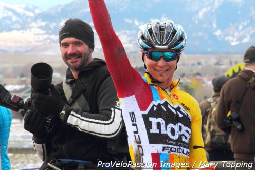 Meredith salutes after winning a muddy Colorado race