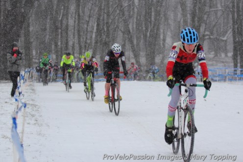 Women's 15-16 field approaches Bonk Breaker Hill in lap one. Clouse slipped a pedal at the start.